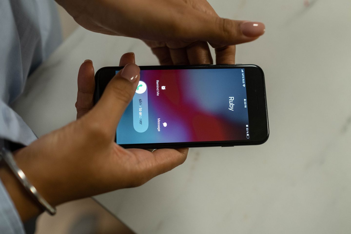 Close up shot of a person calling on a phone, representing UCSTAK's Busy Camp-On & Callback-on-Busy feature.