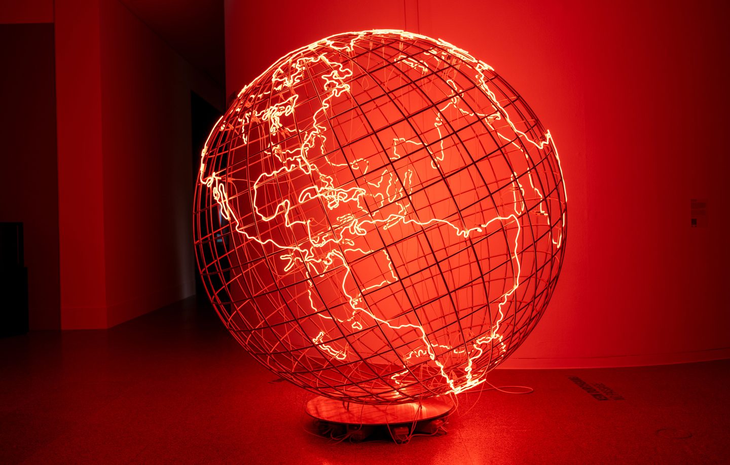 Illuminated planet earth sculpture, representing UCSTAK's International & Long-Distance Calling feature.