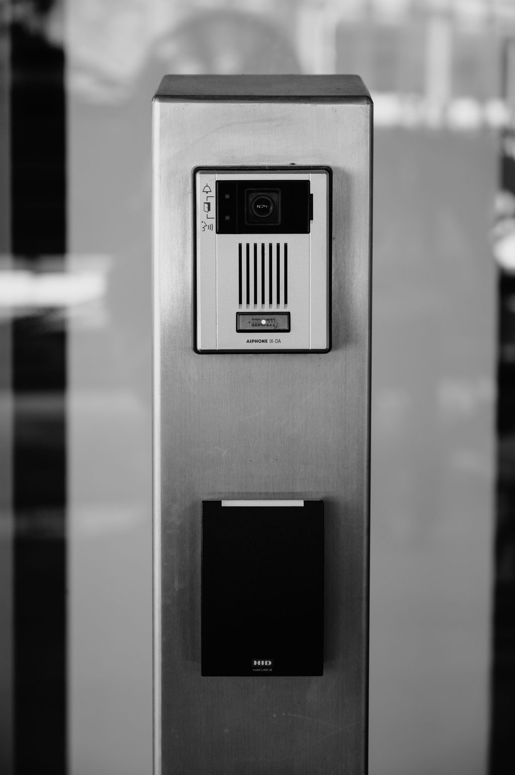Device on Post Behind Window Device on post behind window, representing UCSTAK's Door Phone & Intercom Device Integration feature.