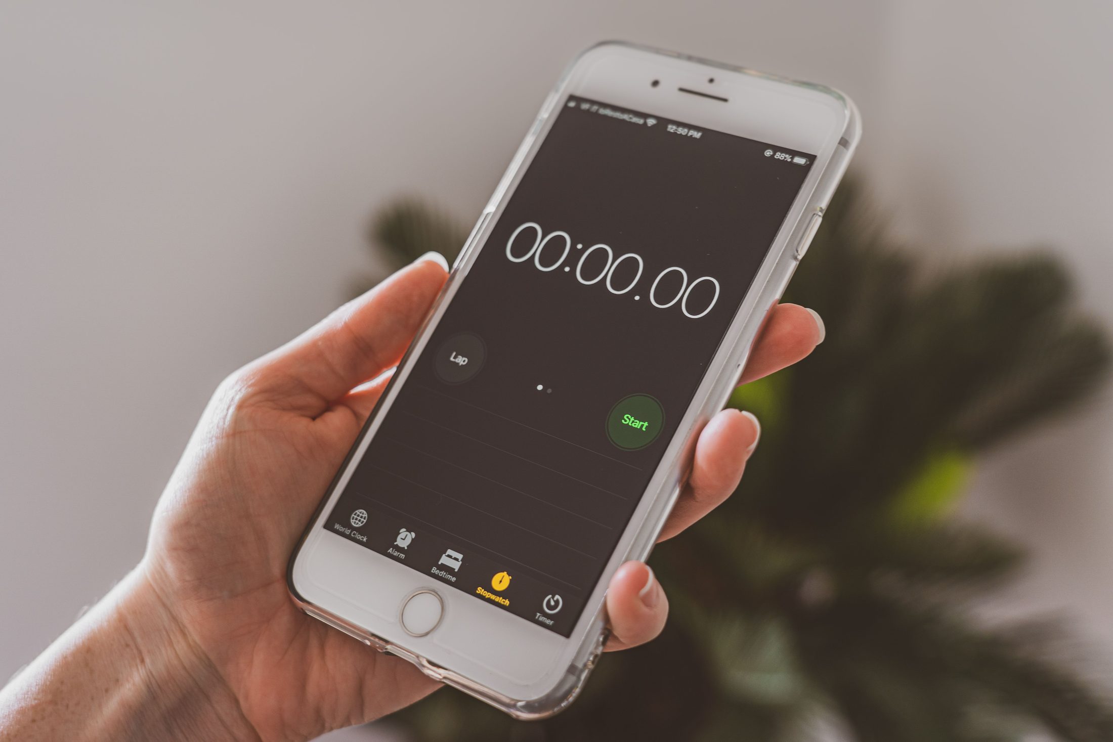 Stopwatch on Smartphone Stopwatch on smartphone, representing UCSTAK's Queue Callback feature.