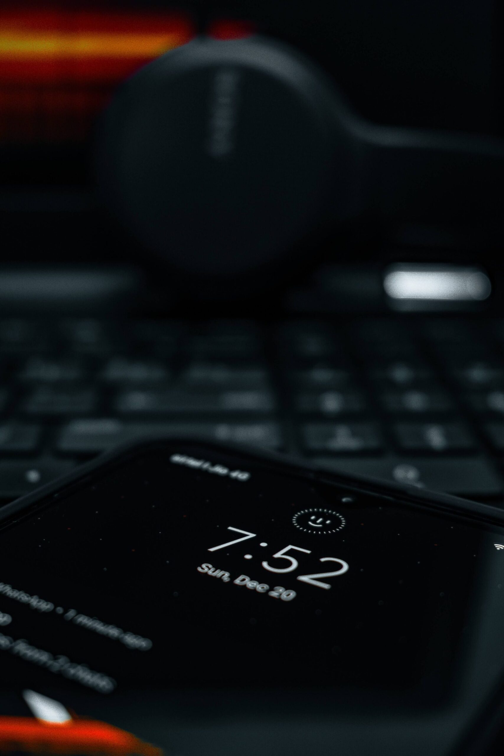 Close Up of Smartphone Display with Close up of smartphone display with laptop background, representing UCSTAK's Voicemail feature.