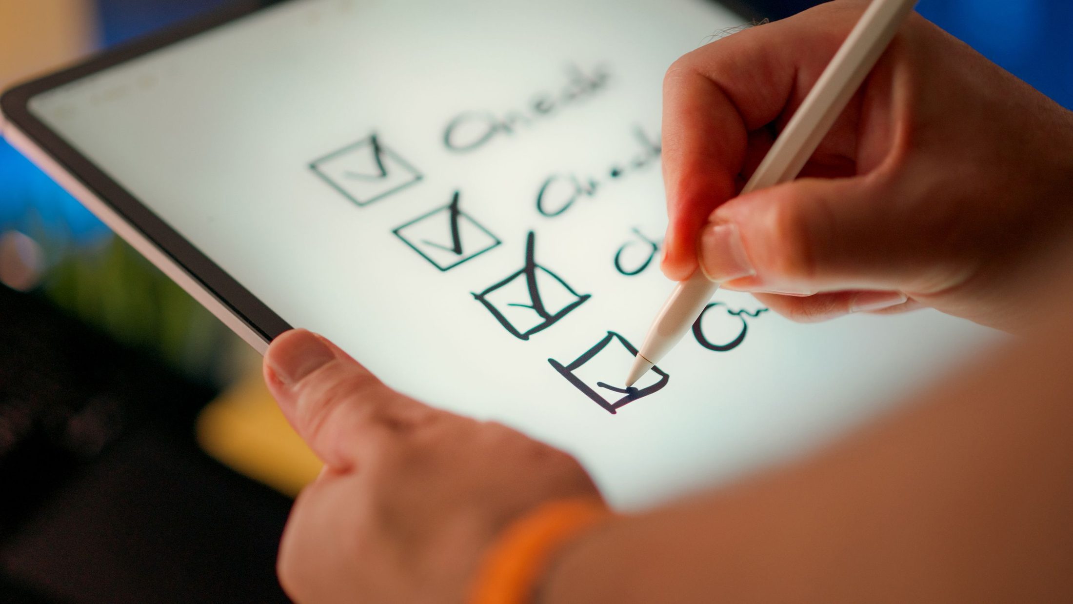 Digital Checklist on Tablet with Stylus Digital checklist on tablet with stylus, representing UCSTAK's GDPR Compliance feature.