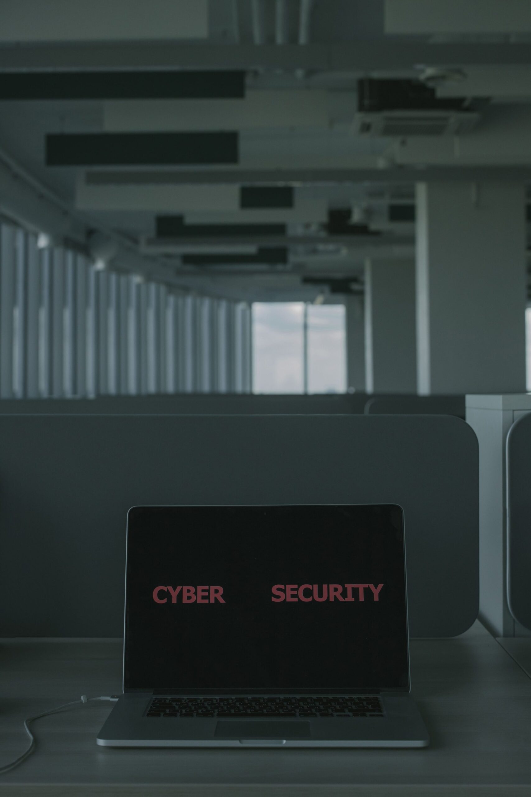 Laptop with Cyber Security Text on Laptop with cyber security text on the screen, representing UCSTAK's Firewall & IP Allow/Block Lists feature.