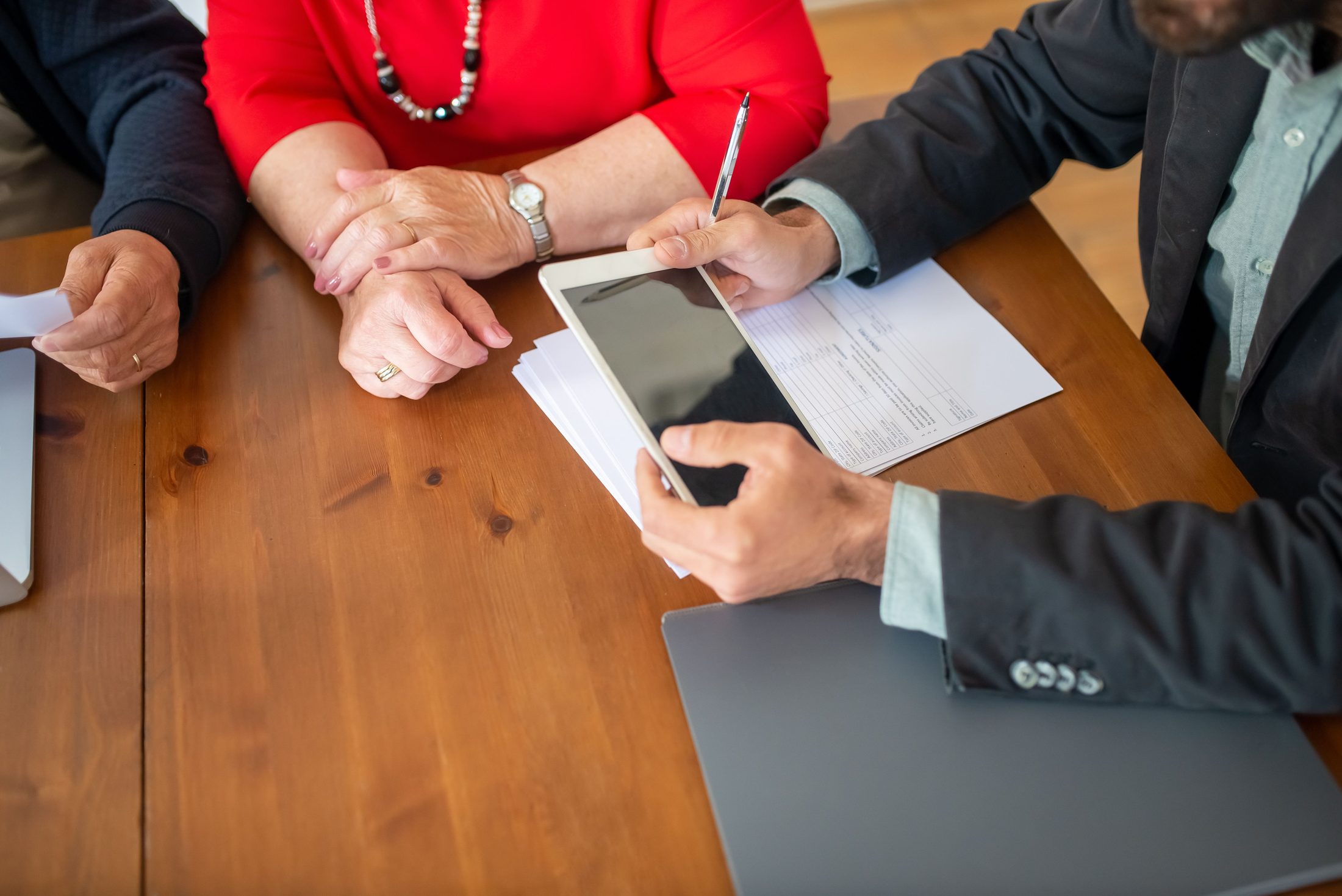 Advisor and client reviewing a quote together on UCSTAK's Pricing page.